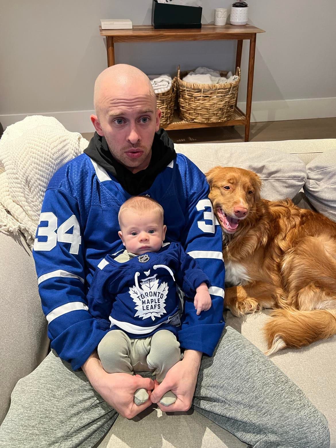 Kyle, Harrison and Penny watching the game