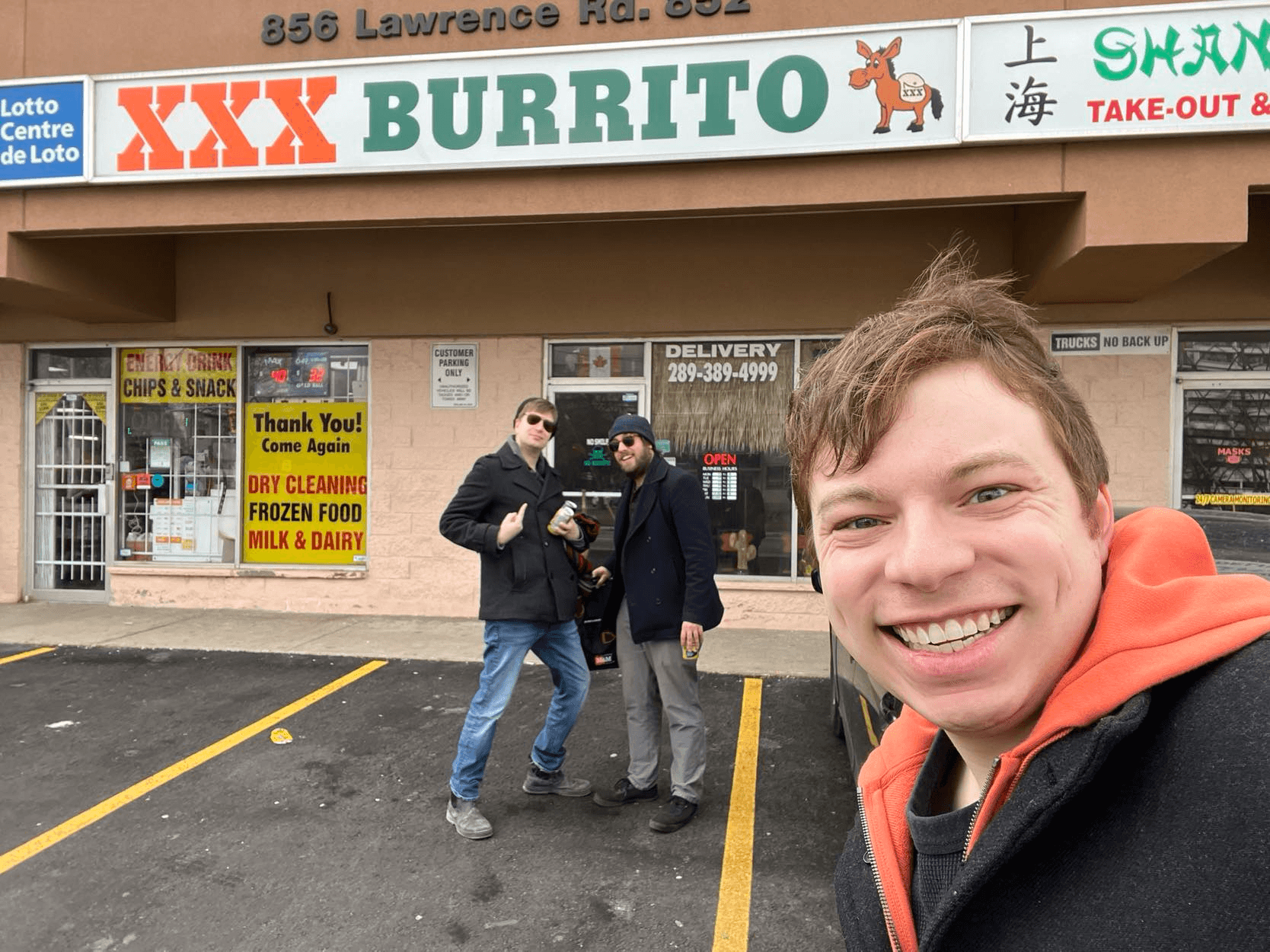 Three buds outside of XXX Burritos