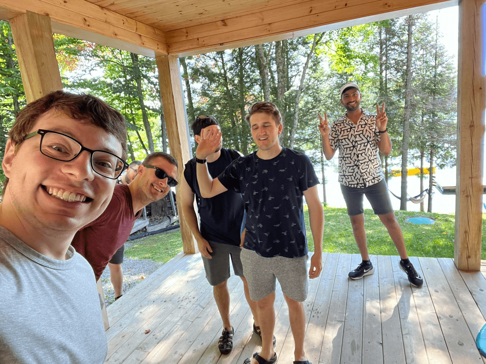 A group of guys on a porch after a fun weekend